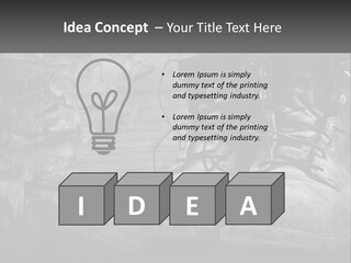 A Black And White Photo Of A Pair Of Boots PowerPoint Template