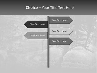 A Black And White Photo Of A Pair Of Boots PowerPoint Template