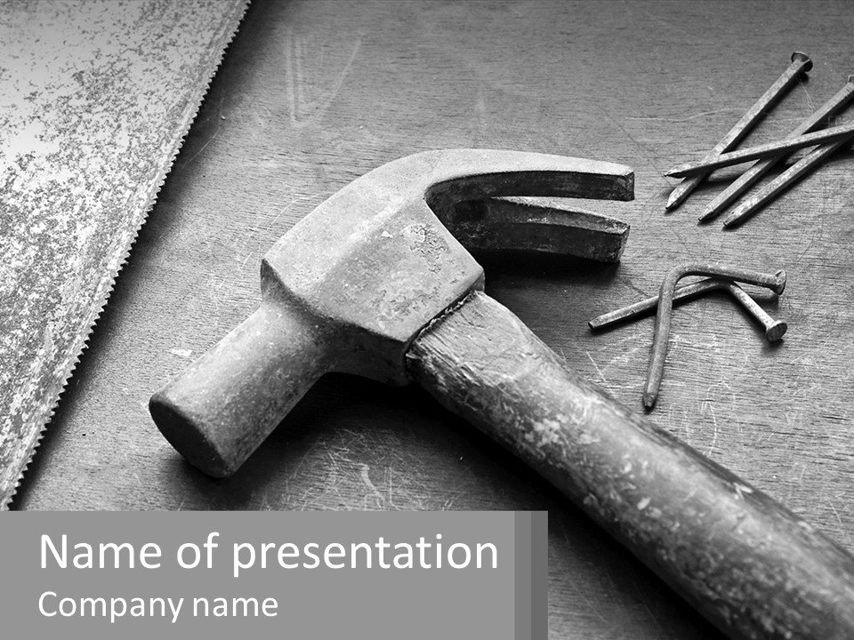 A Hammer And Nails On A Table Powerpoint Template PowerPoint Template