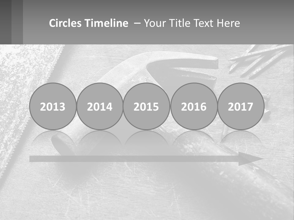 A Hammer And Nails On A Table Powerpoint Template PowerPoint Template