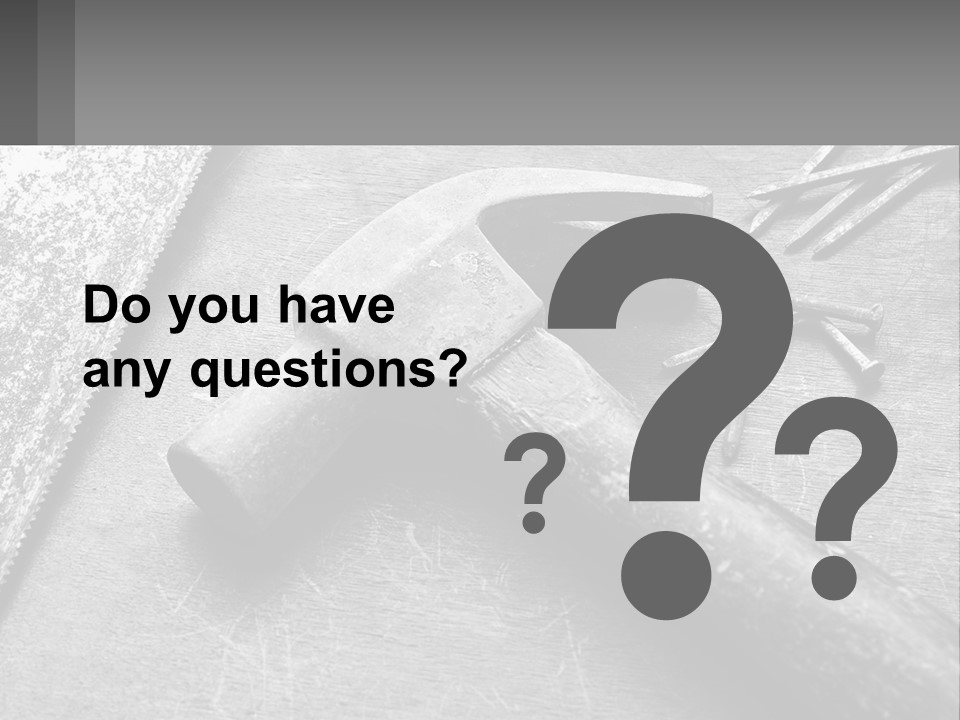 A Hammer And Nails On A Table Powerpoint Template PowerPoint Template