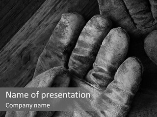 A Black And White Photo Of A Pair Of Gloves PowerPoint Template