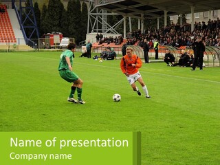 A Group Of Young Men Playing A Game Of Soccer PowerPoint Template