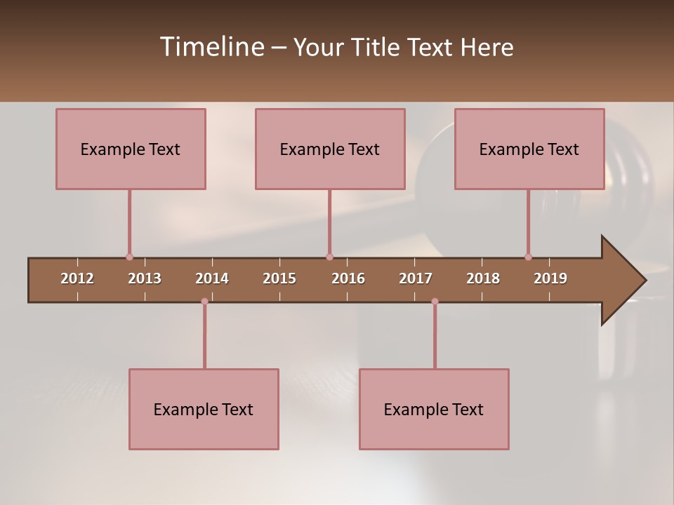 A Wooden Judge's Gavel Sitting On Top Of A Wooden Table PowerPoint Template