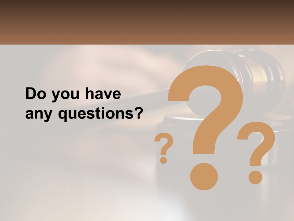 A Wooden Judge's Gavel Sitting On Top Of A Wooden Table PowerPoint Template