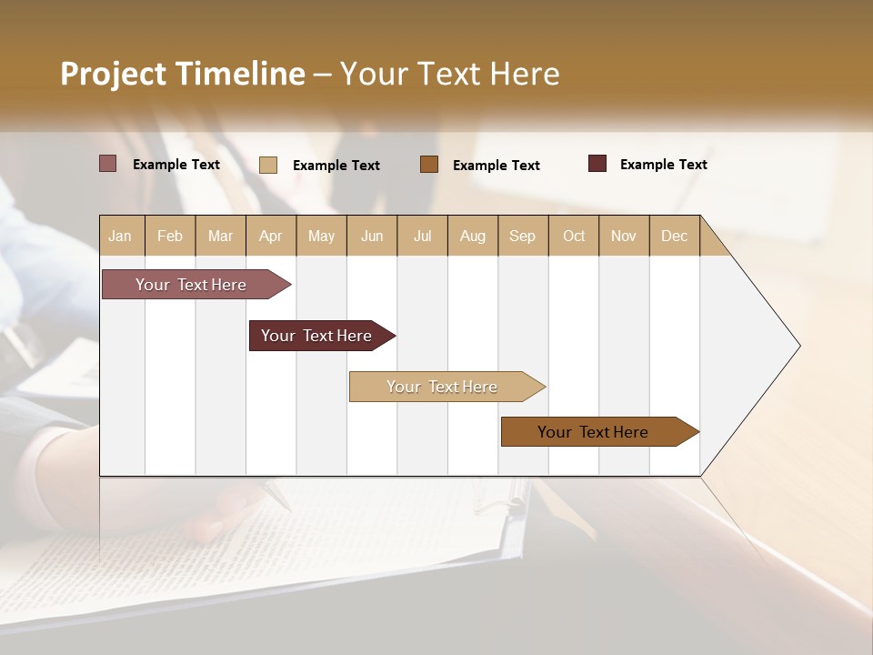 A Group Of People Sitting At A Conference Table PowerPoint Template