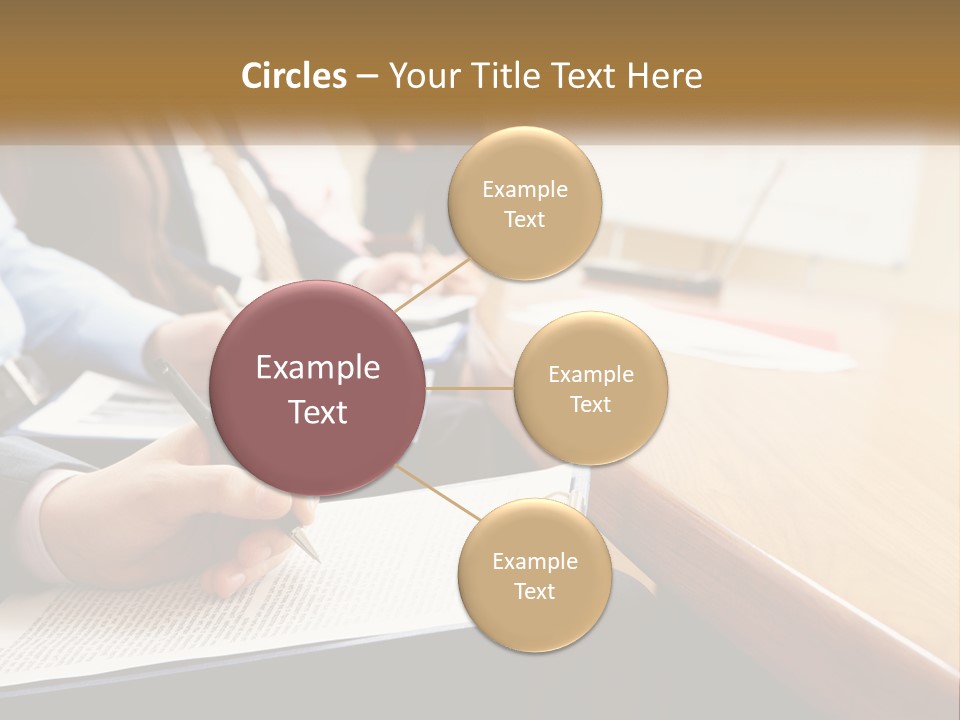 A Group Of People Sitting At A Conference Table PowerPoint Template