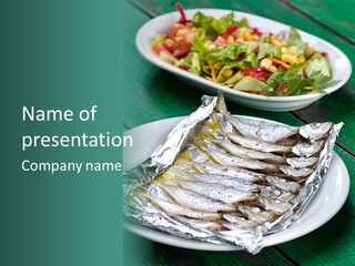 A Plate Of Fish Next To A Bowl Of Salad PowerPoint Template