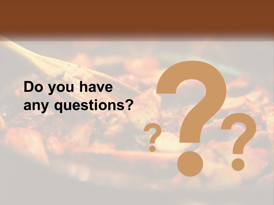 A Pan Filled With Food And A Wooden Spoon PowerPoint Template