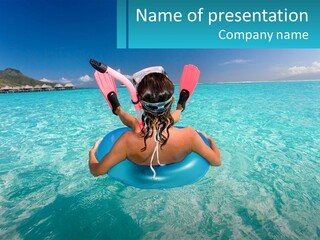 A Woman Is Sitting On An Inflatable In The Ocean PowerPoint Template