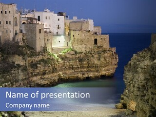 A Large Body Of Water Next To A Rocky Cliff PowerPoint Template