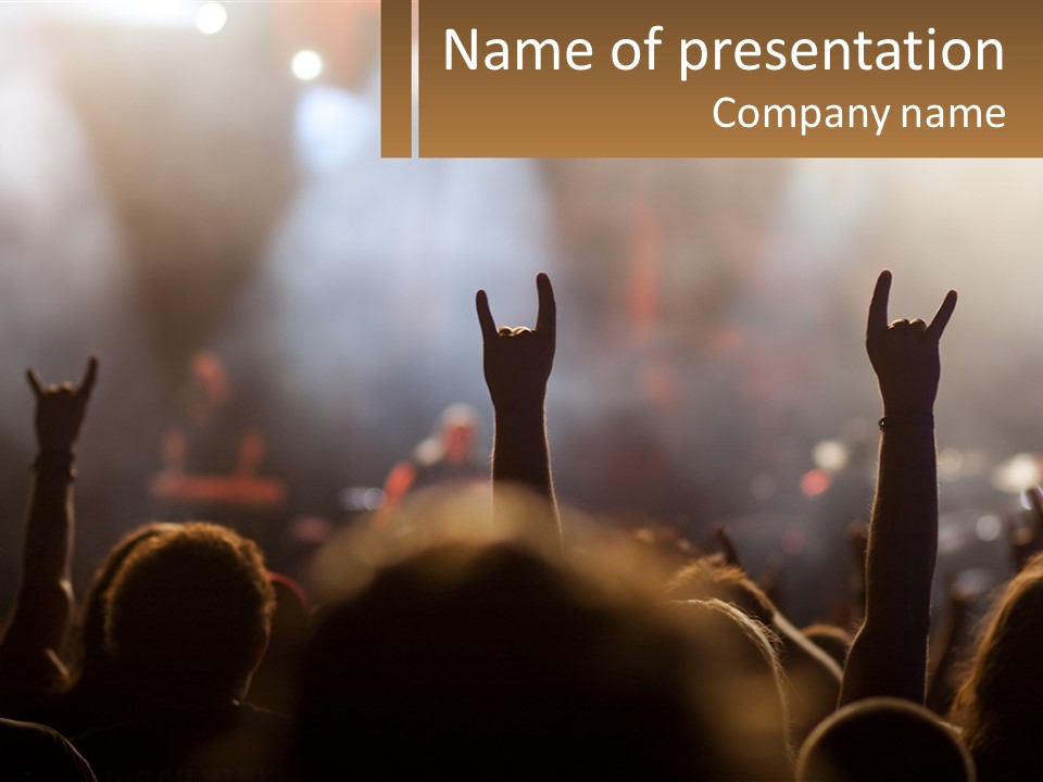 A Crowd Of People At A Concert Raising Their Hands PowerPoint Template
