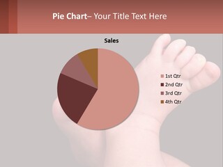 A Baby's Foot With A Black Background PowerPoint Template