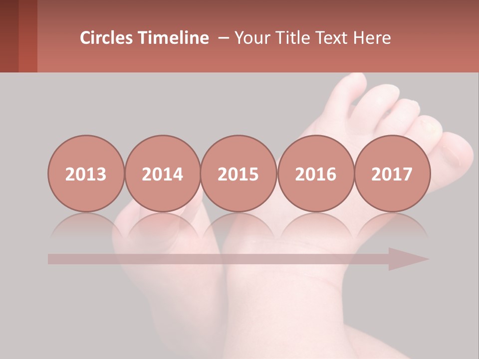 A Baby's Foot With A Black Background PowerPoint Template