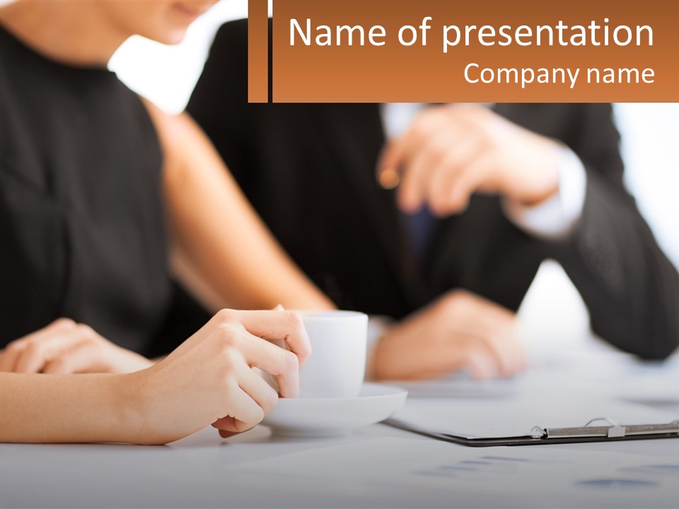 A Couple Of People Sitting At A Table With A Cup PowerPoint Template