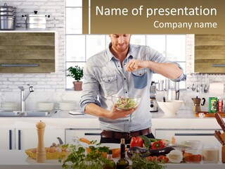 A Man Is Preparing A Salad In The Kitchen PowerPoint Template