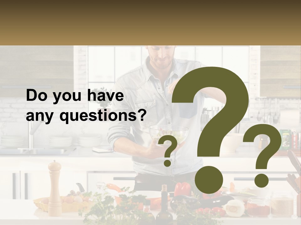 A Man Is Preparing A Salad In The Kitchen PowerPoint Template