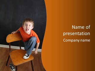 A Young Boy Sitting On A Wooden Chair With His Mouth Open PowerPoint Template