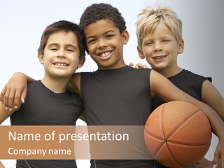 A Group Of Young Boys Standing Next To Each Other Holding A Basketball PowerPoint Template