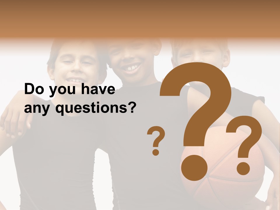 A Group Of Young Boys Standing Next To Each Other Holding A Basketball PowerPoint Template