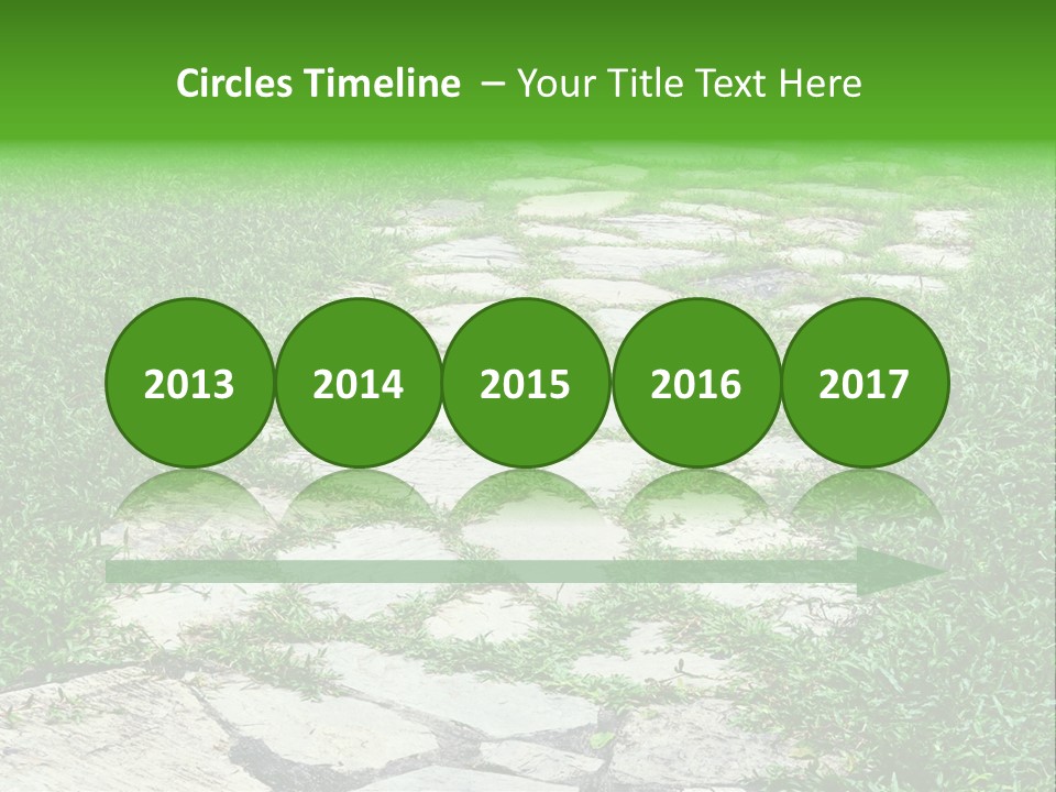 A Stone Path In The Middle Of A Grassy Field PowerPoint Template