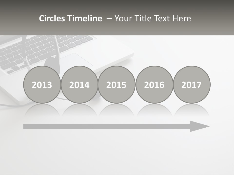 A Laptop With A Headset On Top Of It PowerPoint Template