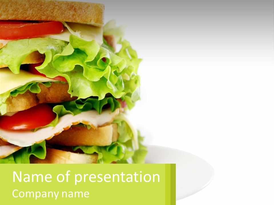 A Big Sandwich With Lettuce And Tomatoes On It PowerPoint Template