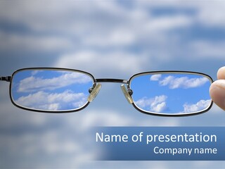 A Hand Holding A Pair Of Glasses With A Sky In The Background PowerPoint Template
