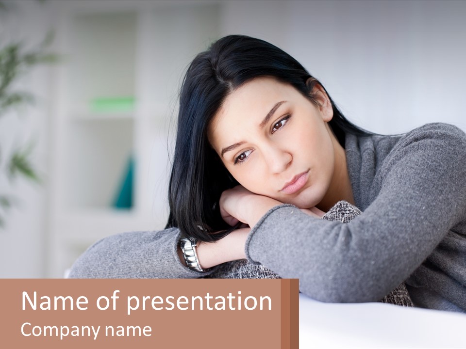 A Woman Sitting On A Bed With Her Hand On Her Chin PowerPoint Template