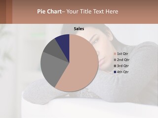 A Woman Sitting On A Bed With Her Hand On Her Chin PowerPoint Template