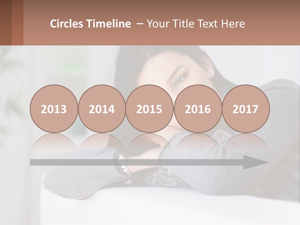 A Woman Sitting On A Bed With Her Hand On Her Chin PowerPoint Template