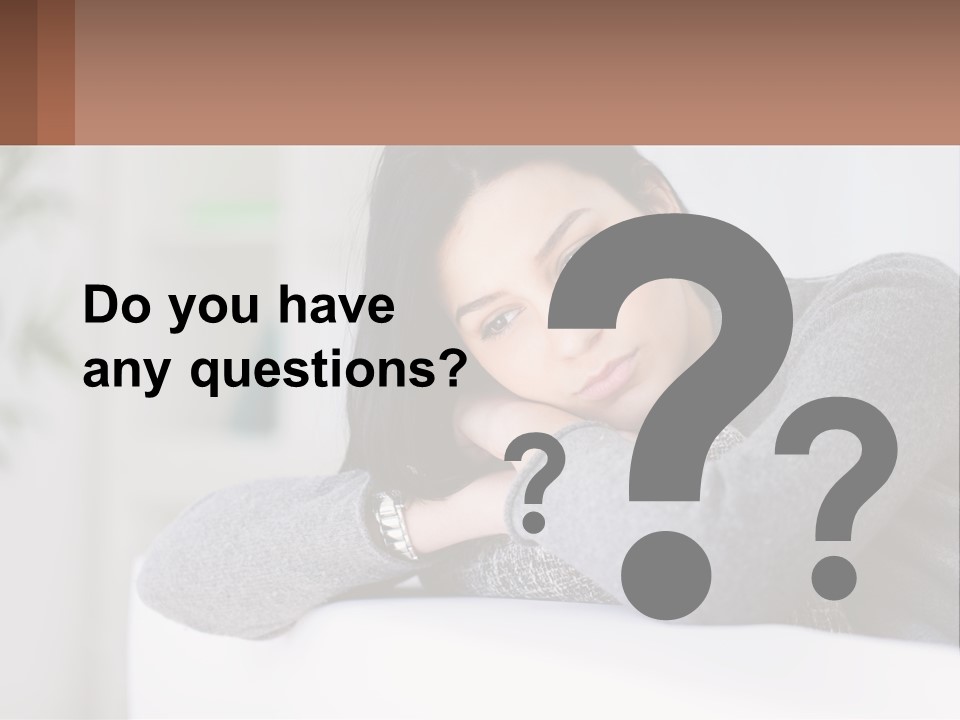 A Woman Sitting On A Bed With Her Hand On Her Chin PowerPoint Template