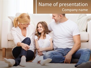 A Family Is Sitting On The Floor Together PowerPoint Template