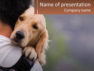 A Man Holding A Dog In His Arms PowerPoint Template