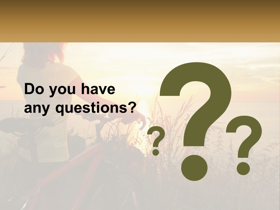 A Woman Riding A Bike Near The Ocean At Sunset PowerPoint Template