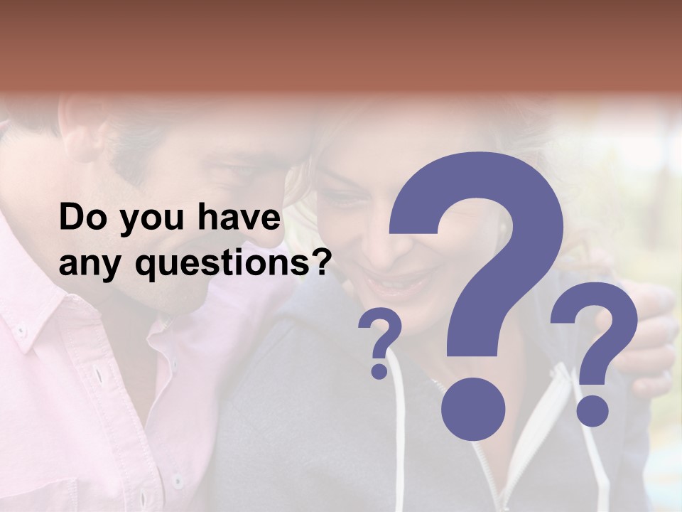 A Man And A Woman Looking At A Cell Phone PowerPoint Template