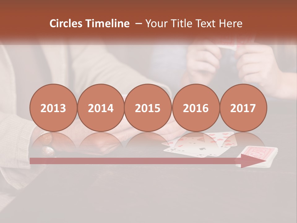 A Man And Woman Playing Cards On A Table PowerPoint Template