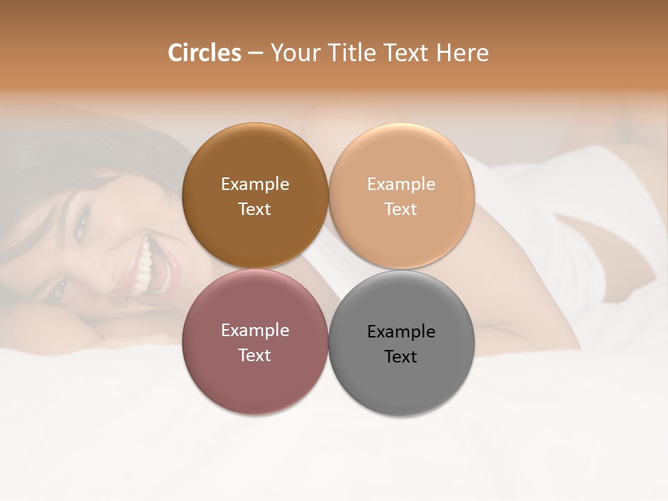 A Woman Laying On A Bed Smiling For The Camera PowerPoint Template