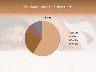 A Woman Laying On A Bed Smiling For The Camera PowerPoint Template