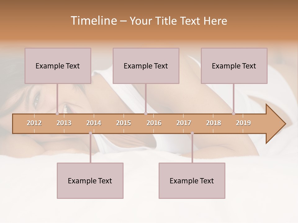A Woman Laying On A Bed Smiling For The Camera PowerPoint Template