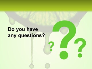 A Slice Of Lime With Drops Of Water On It PowerPoint Template