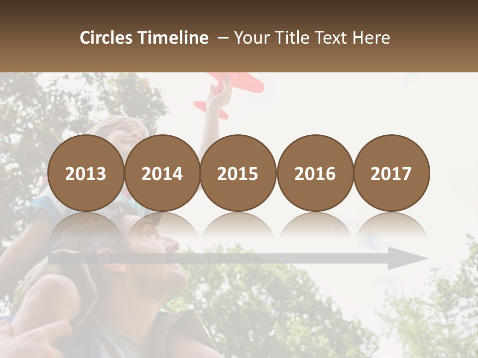 A Man Holding A Small Child On His Shoulders PowerPoint Template