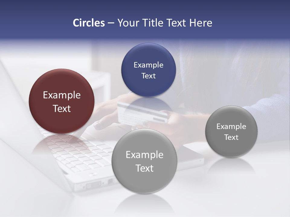 A Woman Holding A Credit Card While Using A Laptop PowerPoint Template