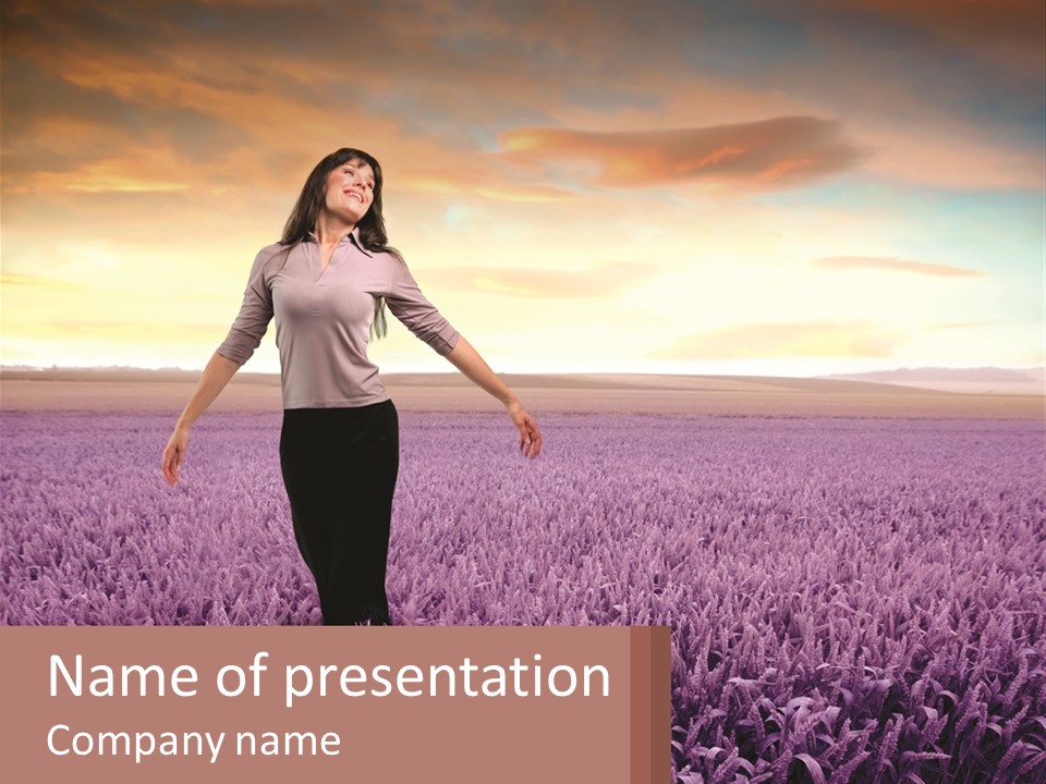 A Woman Standing In A Field Of Purple Flowers PowerPoint Template