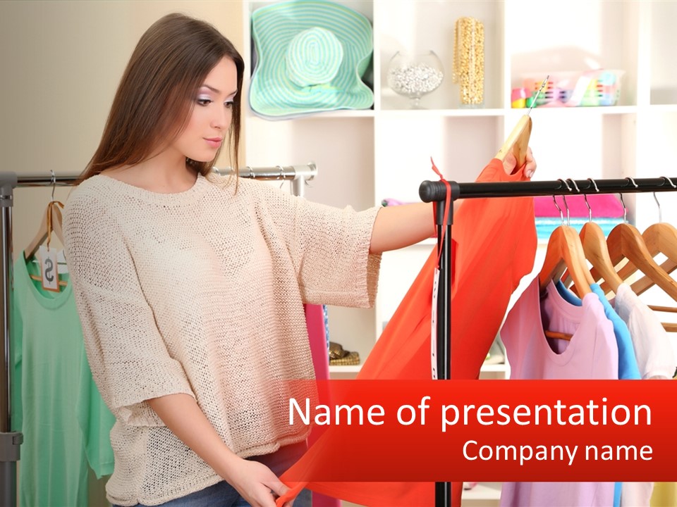 A Woman Looking At Clothes On A Rack PowerPoint Template