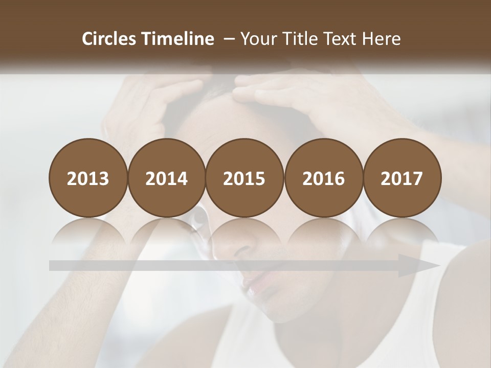 A Man Holding His Hair In Front Of His Head PowerPoint Template