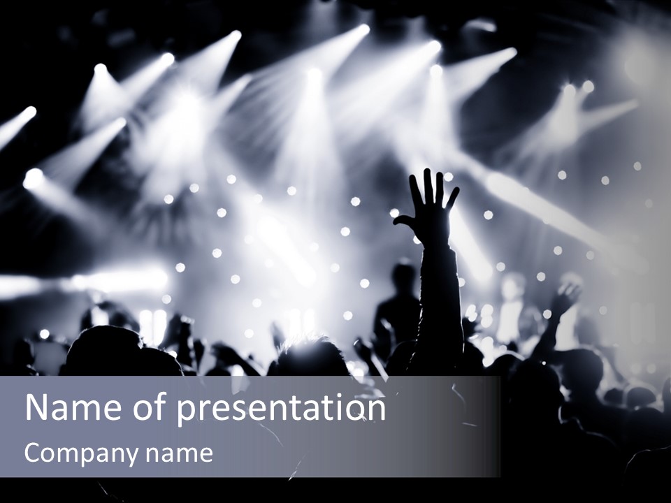 A Crowd Of People At A Concert With Their Hands Up PowerPoint Template