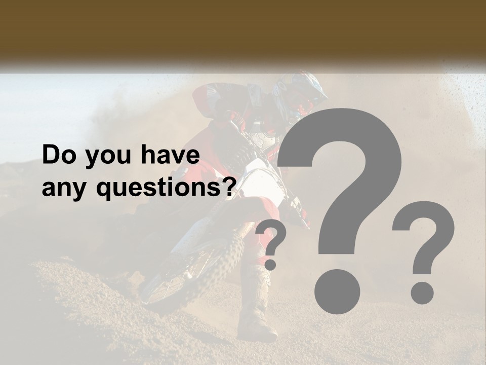 A Person Riding A Dirt Bike On A Dirt Track PowerPoint Template