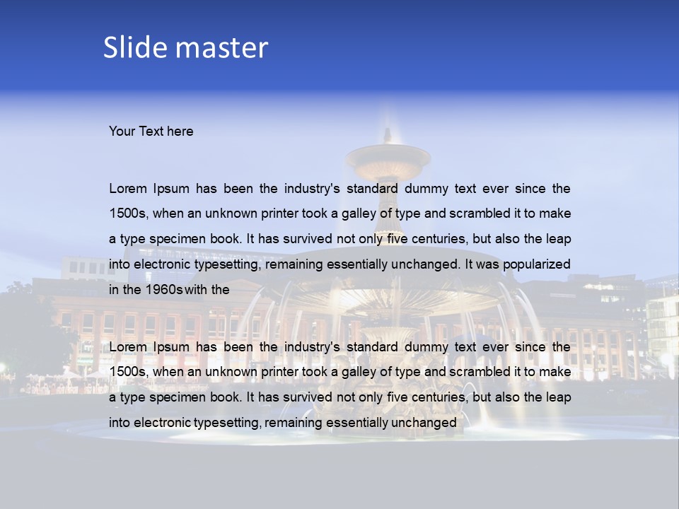 A Fountain In Front Of A Building At Night PowerPoint Template