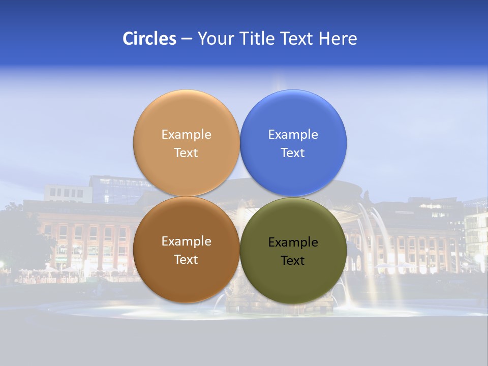 A Fountain In Front Of A Building At Night PowerPoint Template